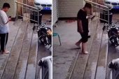 Yağmurlu havada banyo terliğiyle kaygan merdivenden inmeye çalışan genç, iki denemede de tıpkı sonucu aldı